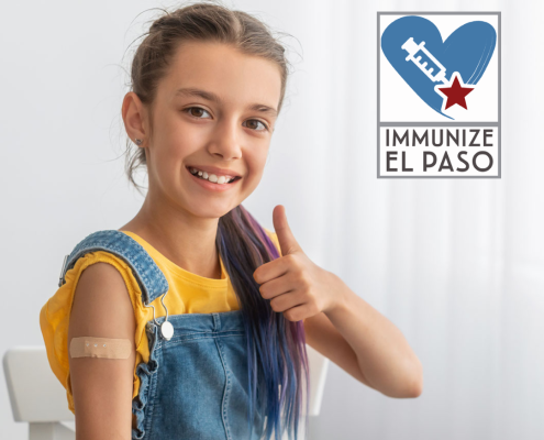 vaccinated child giving thumbs up